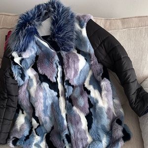 Macy’s brand fur coat. Knee length. Navy blue sleeves. Zip closure. Fur collar.